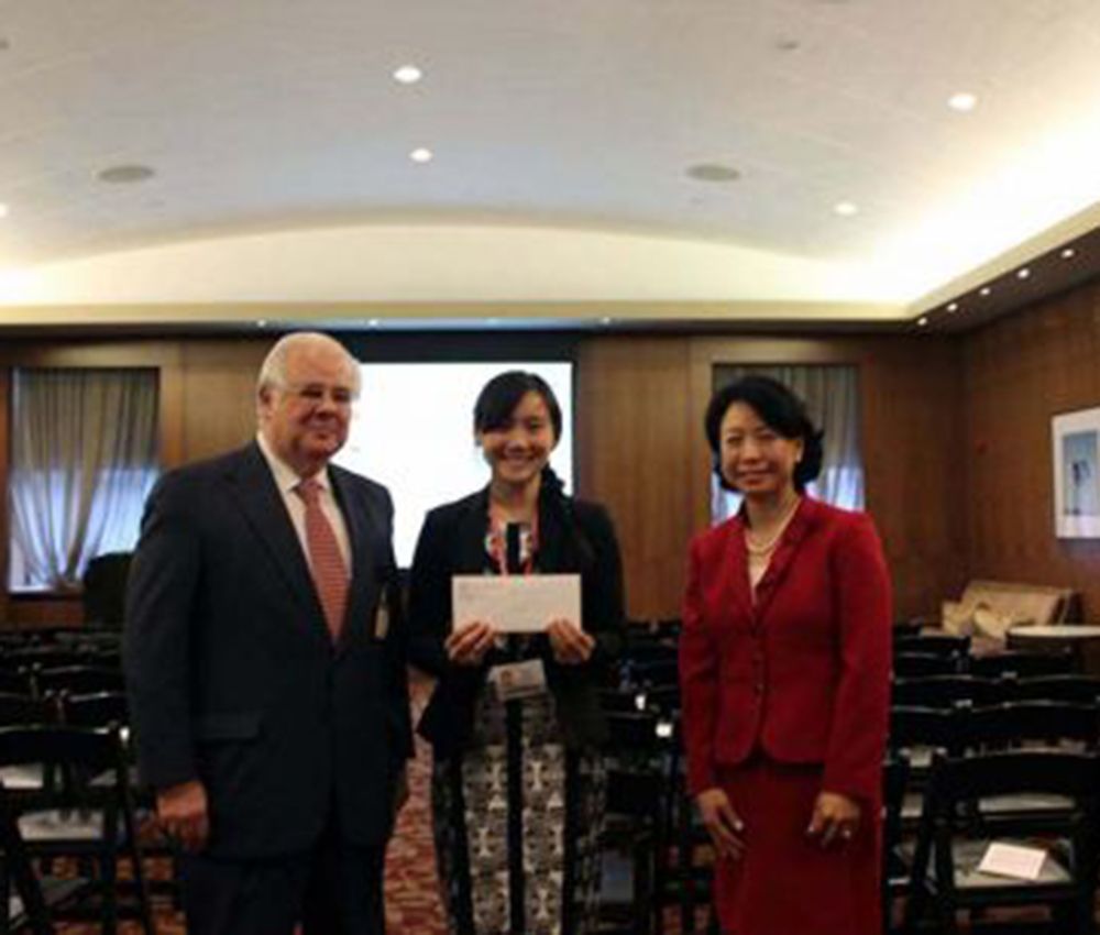 Dr. Esther Cheng (PGY-3) receiving her award from Dr. Daniel M. Knowles and Dr. Sandra J. Shin (Program Director) for her oral presentation &quot;Subareolar Sclerosing Ductal Hyperplasia (SSDH): Further Characterization of a Distinct Clinicopathological...&quot;
